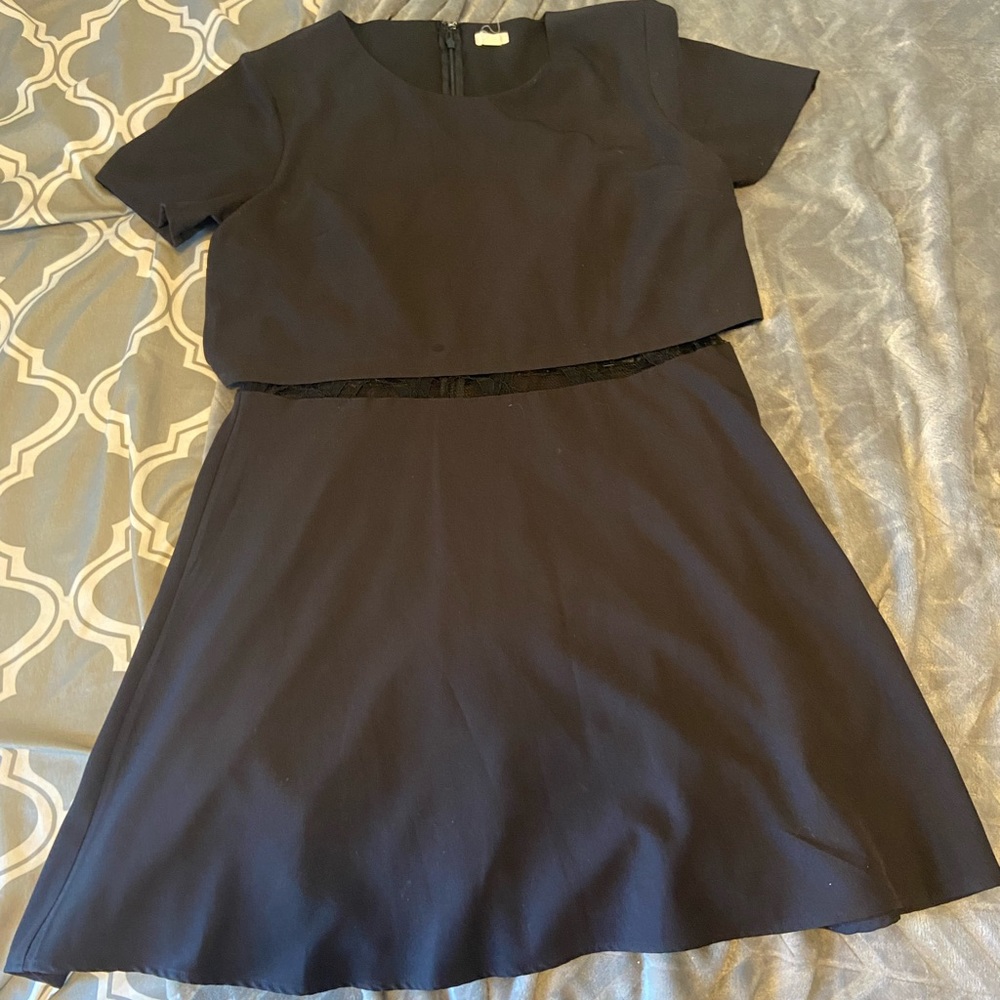 Garage dress. Size Large. Fit and flare with lace midsection. Zipper back.